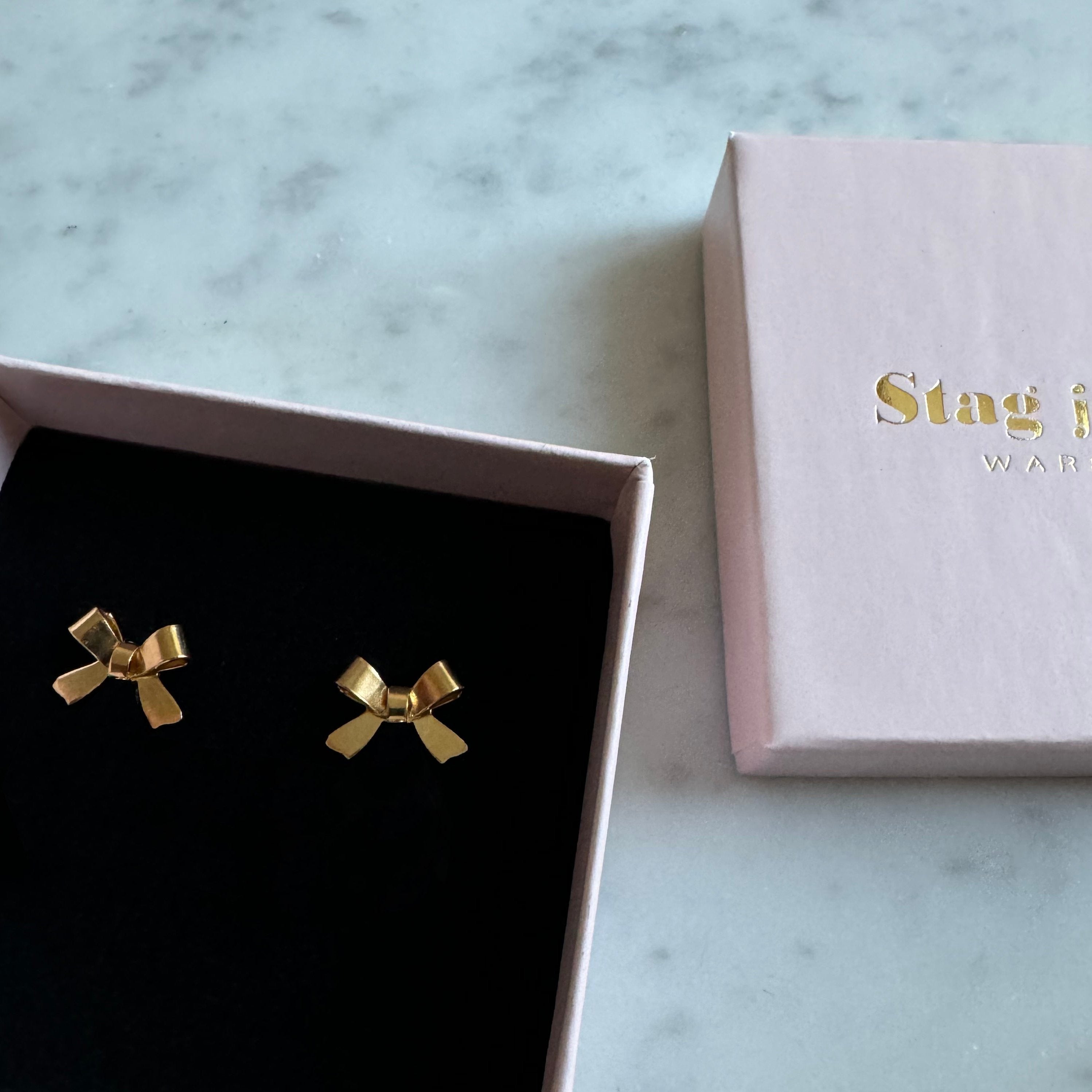 Bow earrings gold